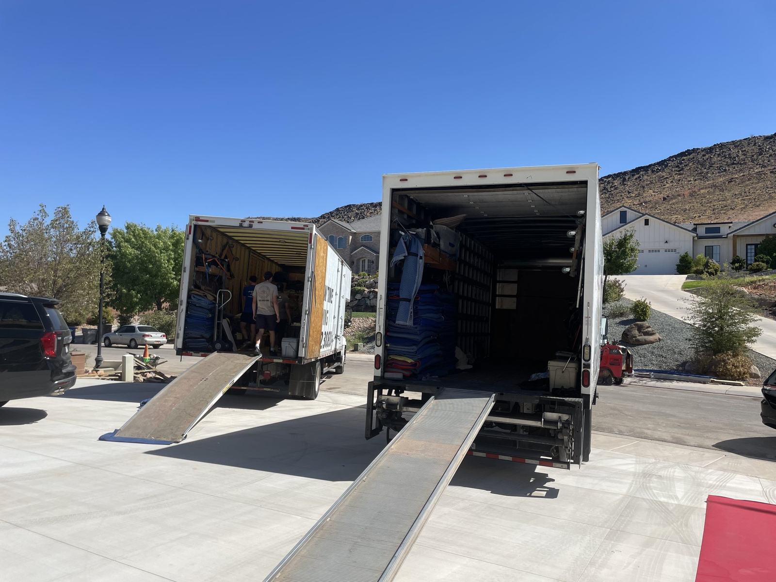 Just-In Time crew loading a branded truck outside a Southern Utah home